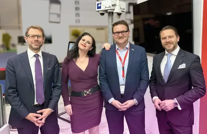 Michael Kulig, Daniela Gröbel-Becker, Sven Horstmann and Sebastian Kulig at the Klüh Security GmbH exhibition stand