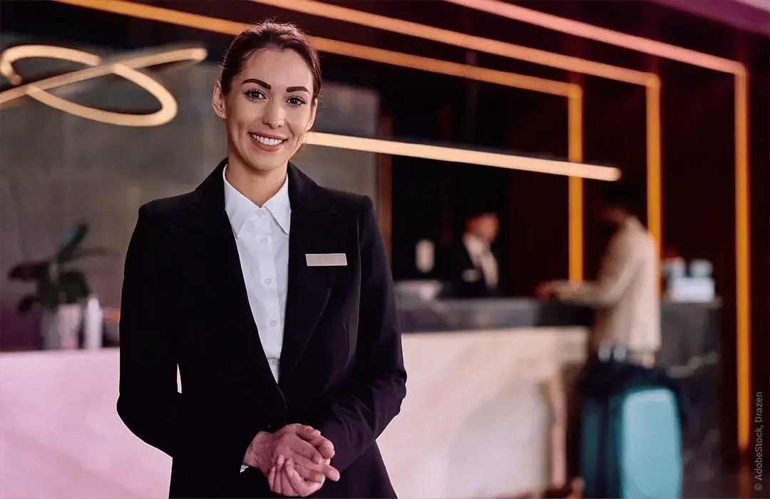 Woman_Female_Concierge_Reception_Desk_Hotel_Apartment_Building