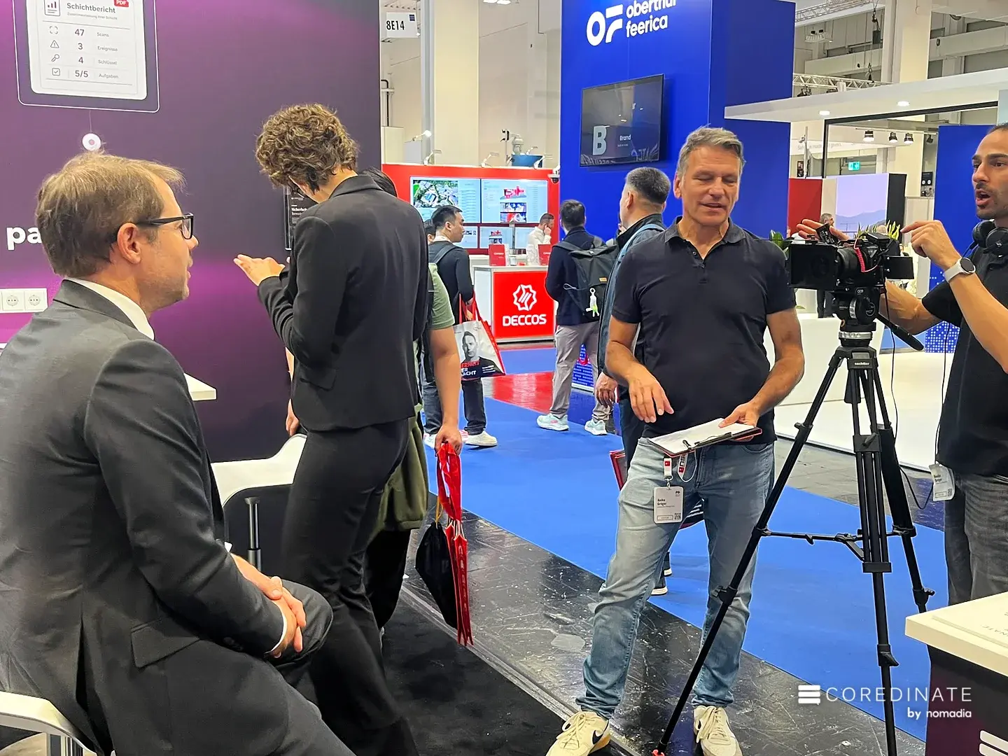 Kamerateam beim Dreh am COREDINATE-Stand auf der Security Essen 2026