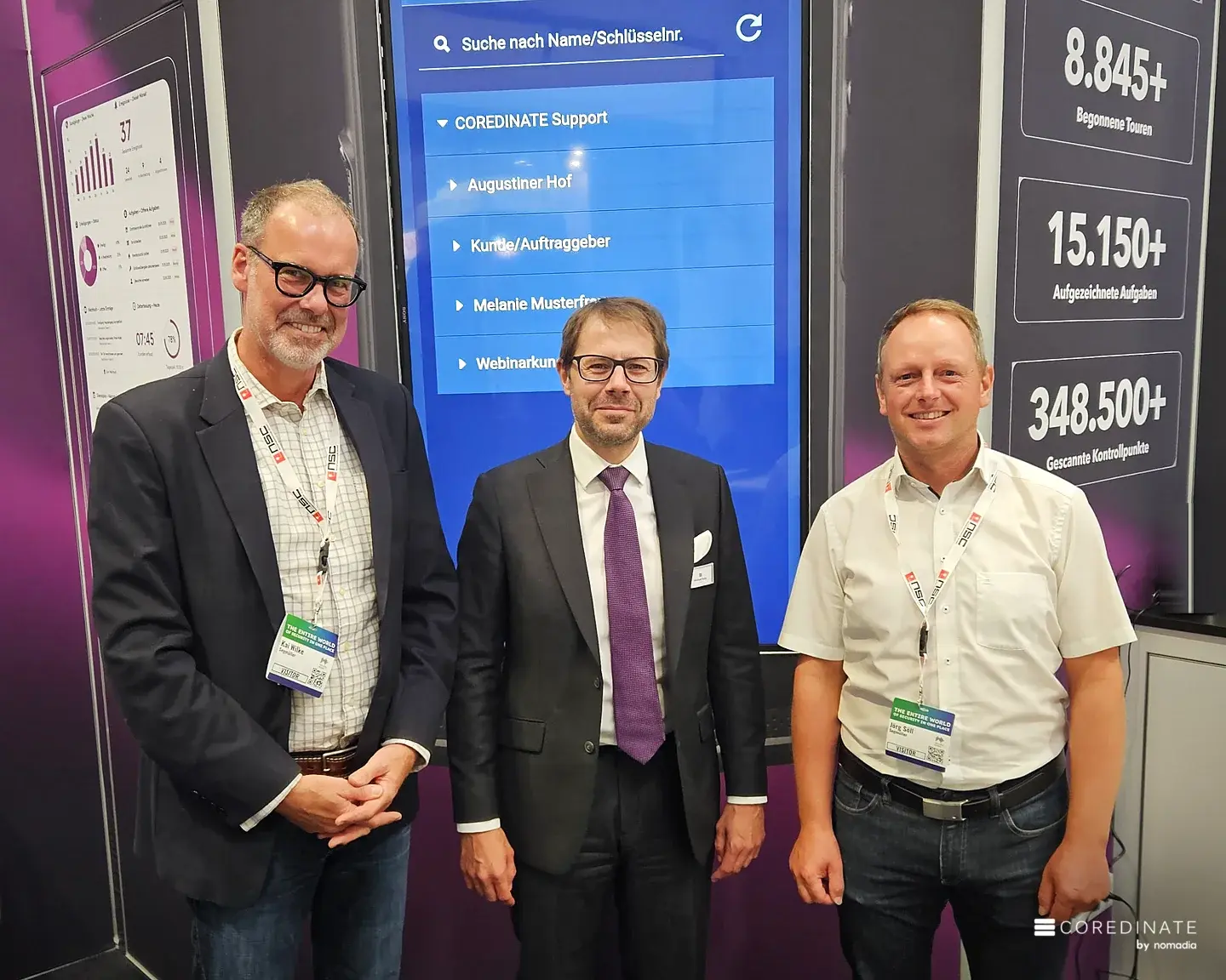 Kai Wilke und Jörg Söll von Segmüller mit Michael Kulig am COREDINATE-Stand auf der Security Essen 2026